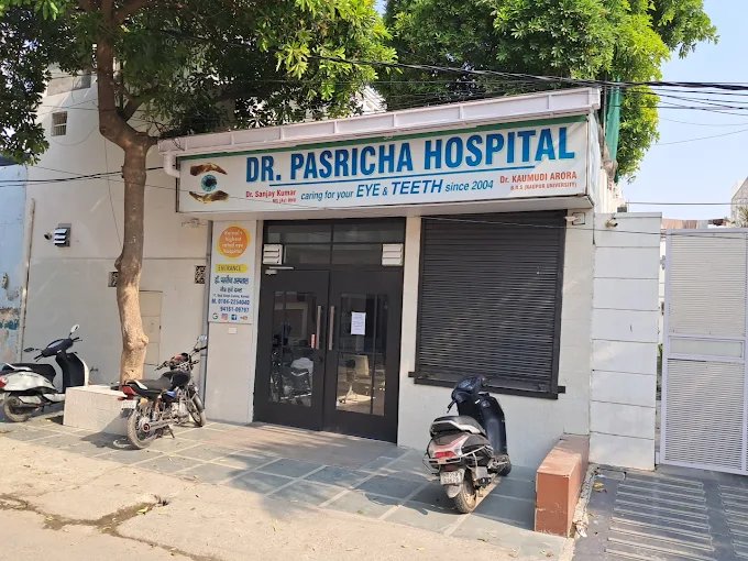 Dr. Pasricha Hospital — Eye & Teeth signage, Karnal